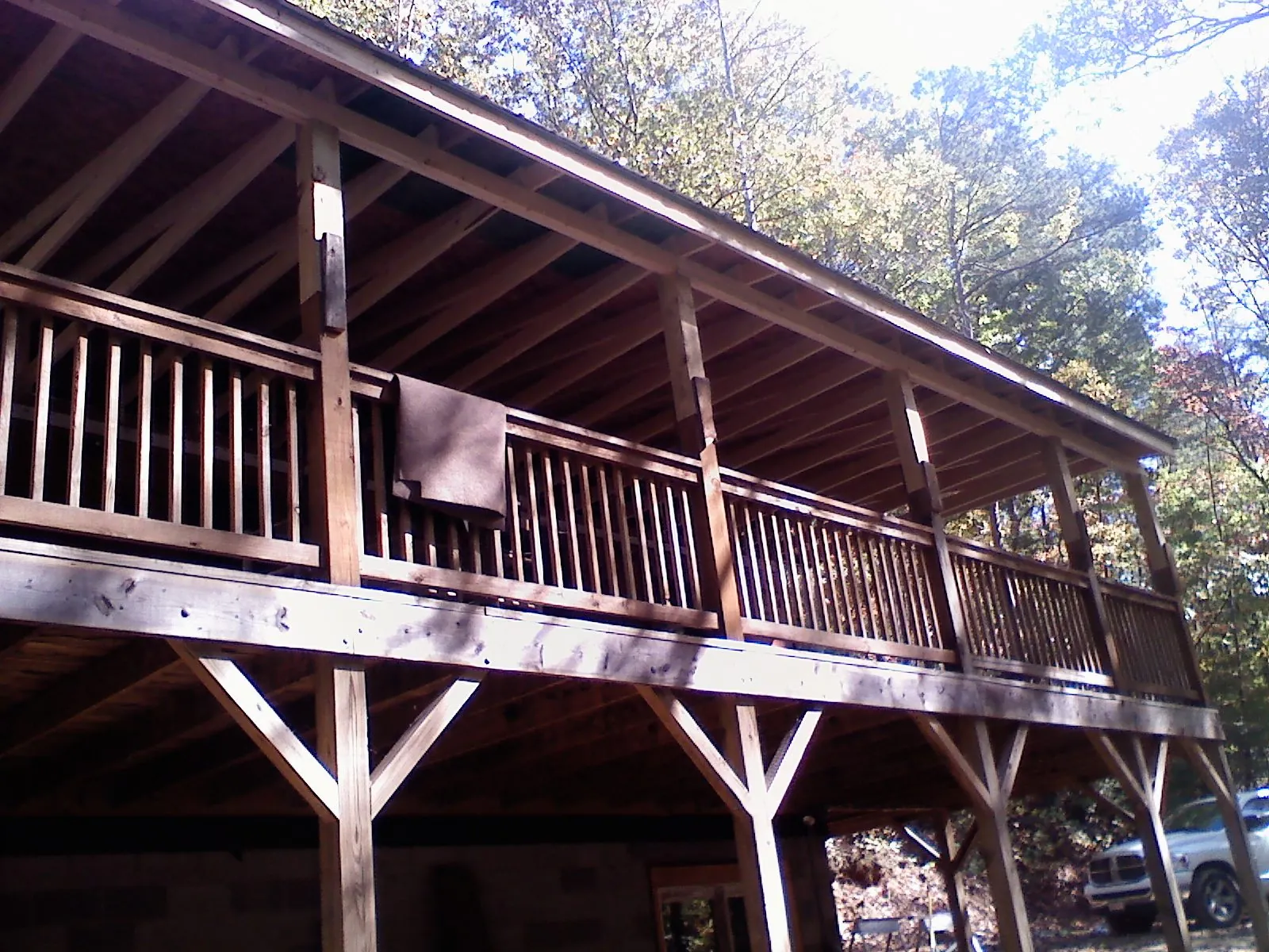 Timber framing under a new elevated porch and deck — Roof Leak Repair in Pell Lake by Roofing Brothers